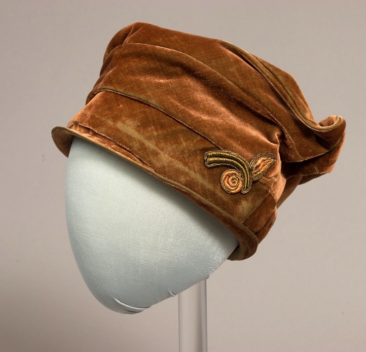 woman's brown velvet hat