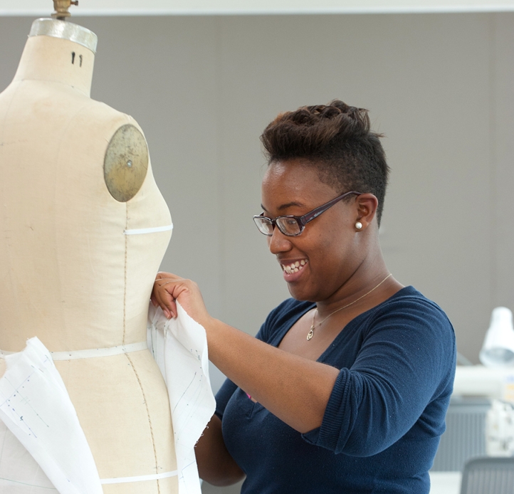 Student working on a dress form